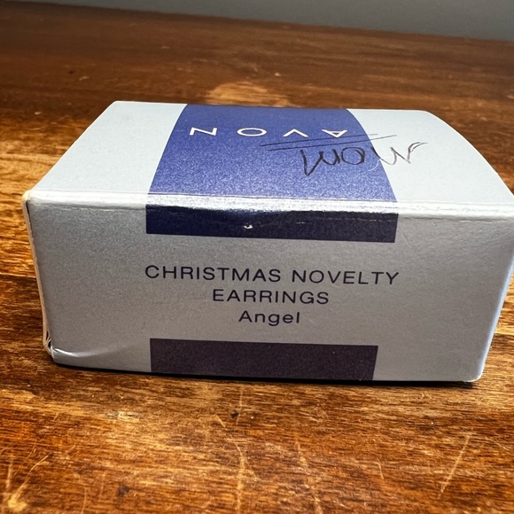 Avon 2001 : white iridescent Angel earrings - Picture 11 of 15